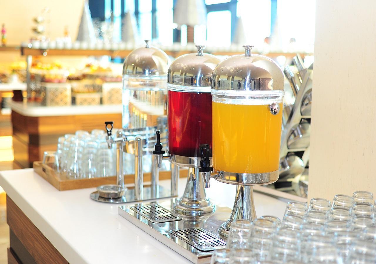 Euphoria Batumi Convention & Casino Hotel Exterior photo Juice dispensers
