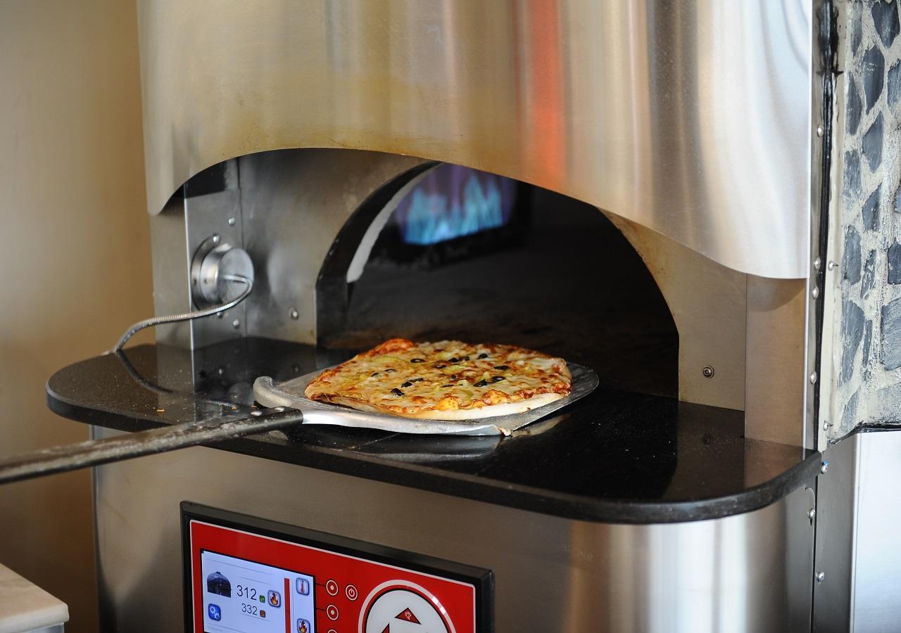 Euphoria Batumi Convention & Casino Hotel Exterior photo A pizza oven