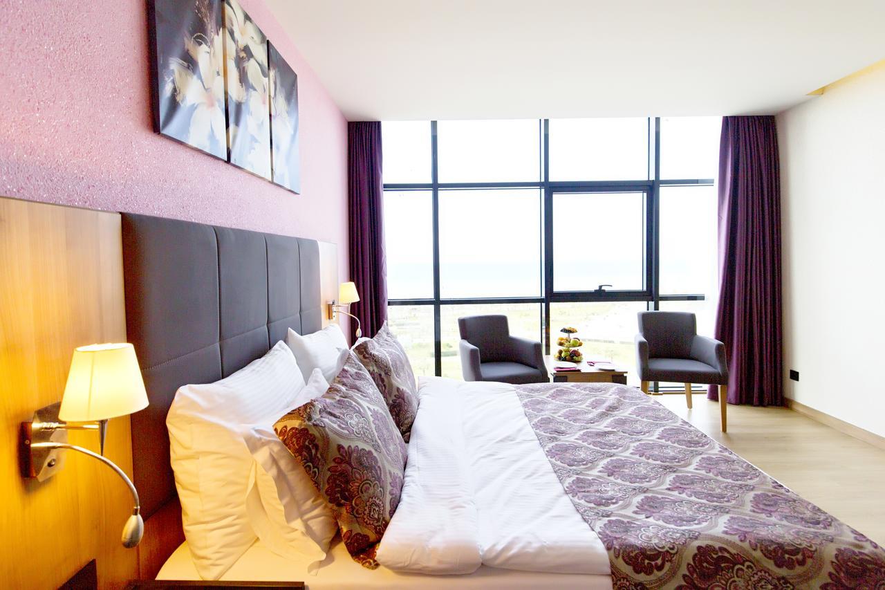 Euphoria Batumi Convention & Casino Hotel Exterior photo A room at the hotel