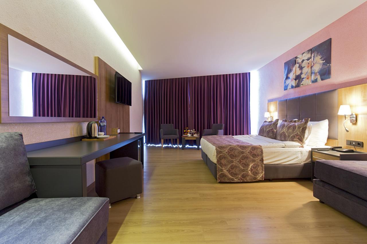 Euphoria Batumi Convention & Casino Hotel Exterior photo A room at the hotel