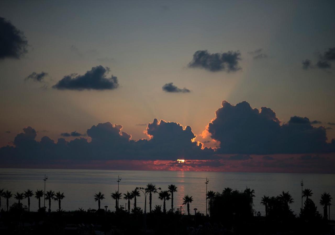 Euphoria Batumi Convention & Casino Hotel Exterior photo Sunset over the Gulf of Mexico
