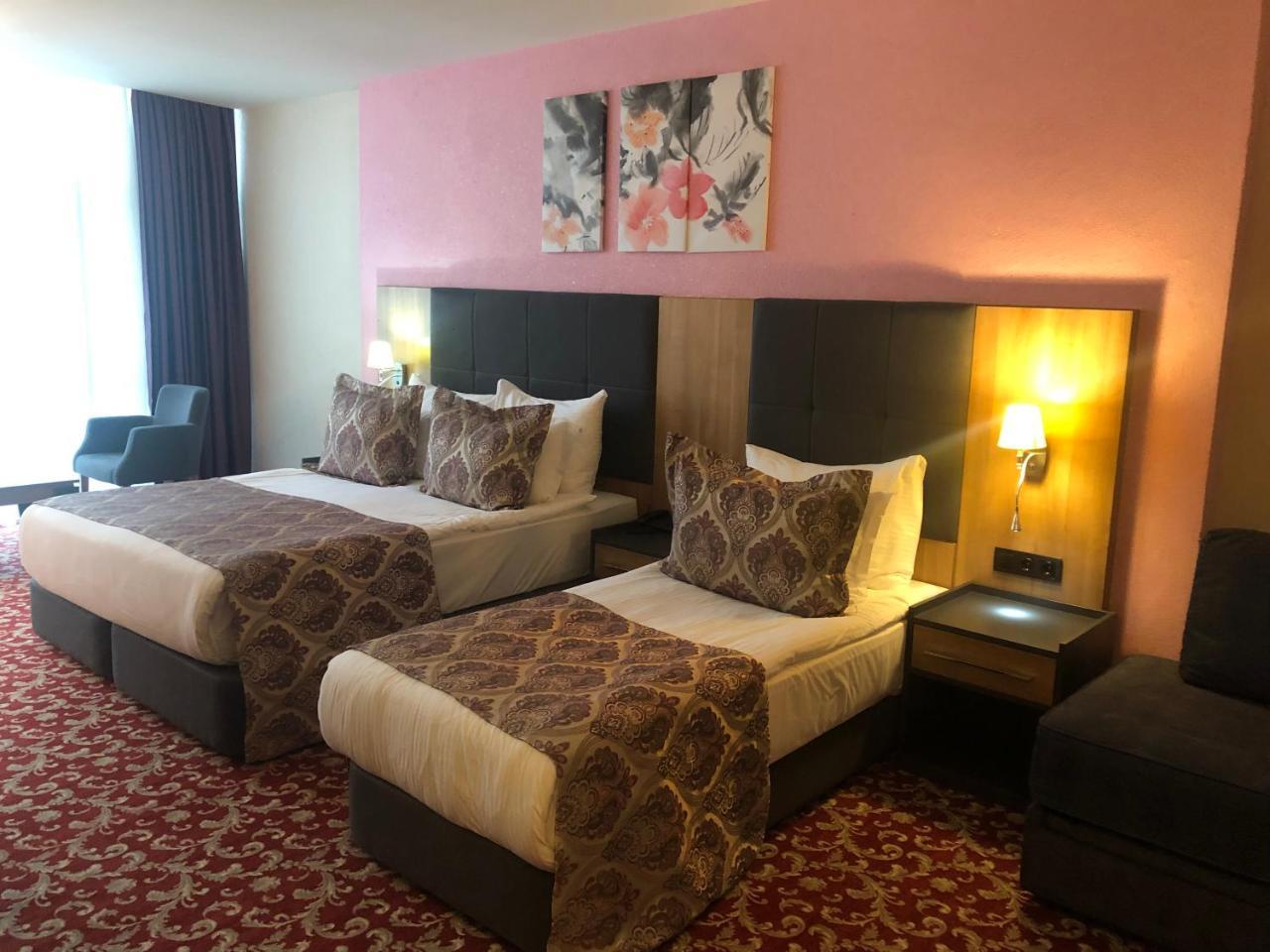 Euphoria Batumi Convention & Casino Hotel Exterior photo A room at the hotel