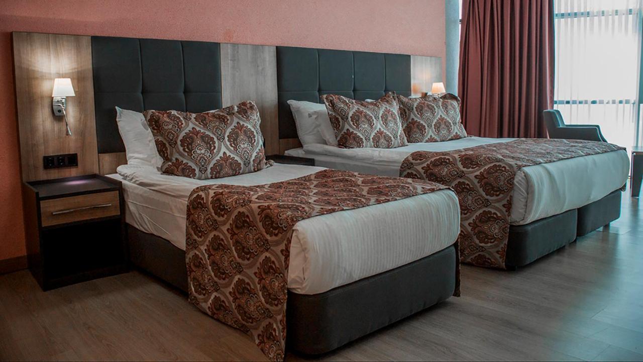 Euphoria Batumi Convention & Casino Hotel Exterior photo A bed runner