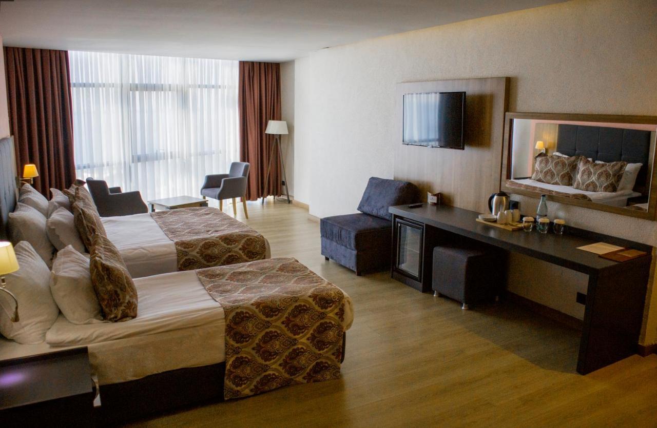 Euphoria Batumi Convention & Casino Hotel Exterior photo A room at the hotel