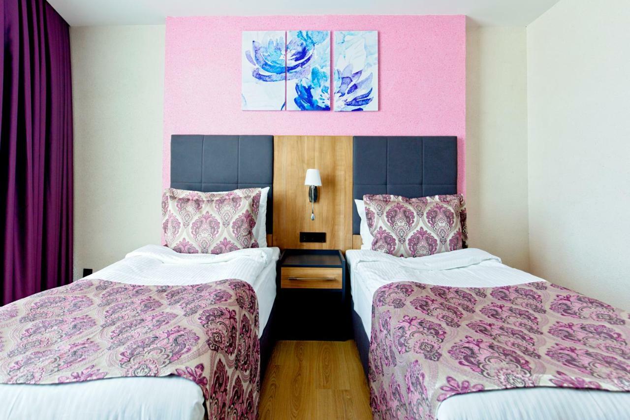 Euphoria Batumi Convention & Casino Hotel Exterior photo A room at the hotel