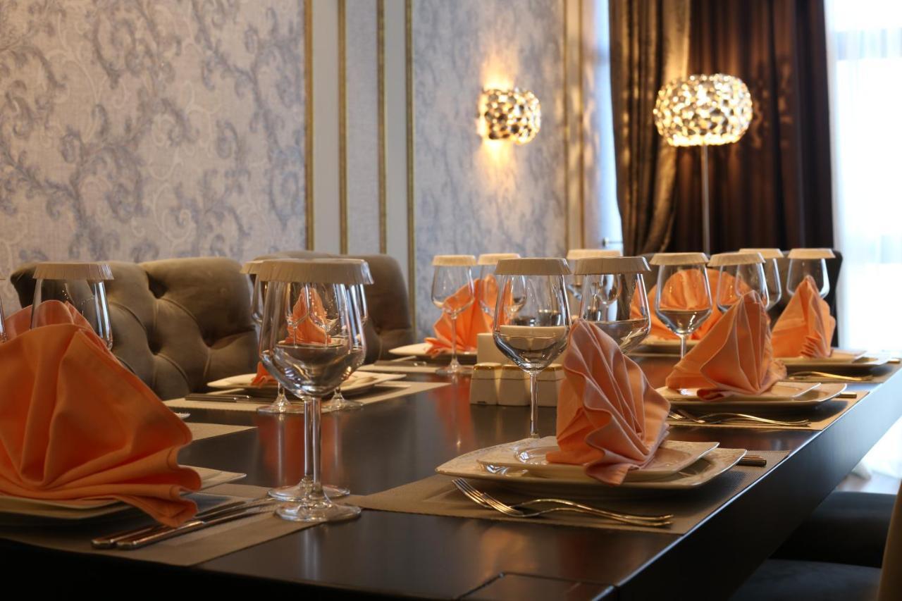 Euphoria Batumi Convention & Casino Hotel Exterior photo A table set for a meal
